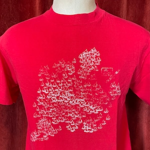 Heavily worn and faded vintage 1980’s sailboats t-shirt, medium