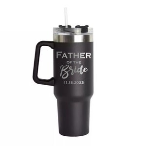 May include: Black stainless steel travel mug with a black handle and a clear lid. The mug has the text "Father of the Bride" and the date "11.18.2023" engraved on the side.