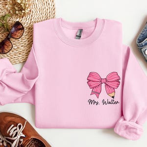 Custom Teacher Coquette Bow Sweatshirt, Cute Teacher Christmas Sweater,Back To School, Custom Teacher Name Hoodie, Teacher Appreciation Gift