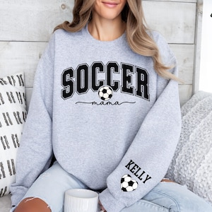 Personalize Soccer Mom Kids Name On Sleeve Sweatshirt, Soccer Mama Hoodie, Gift for Soccer Mom,Fall Soccer Season Hoodie, Mom Soccer Sweater image 1