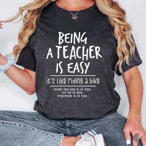 Being A Teacher is Easy, It&#39;s Like Riding A Bike Shirt, Funny Teacher Shirt, Back to School Teacher Tee,Cute Teacher Outfit,Gift For Teacher