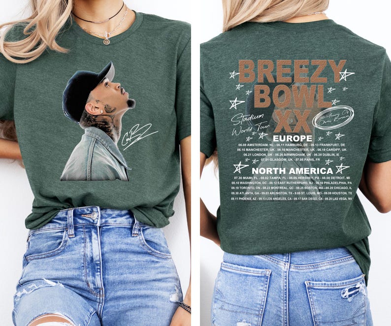 May include: A dark green t-shirt featuring a portrait of a person wearing a baseball cap and denim jacket. The back of the shirt displays the text "BREEZY BOWL XX Stadium World Tour" with a list of European and North American tour dates.