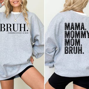 May include: Gray sweatshirt with the text "BRUH." on the front and "MAMA. MOMMY. MOM. BRUH." on the back.