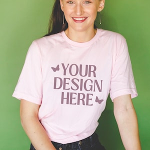Soft Pink Bella Canvas 3001 Mockup: Model Mockup of Pink T-Shirt with Green Background | Minimalist Boho Style Model Mockup of Pink Shirt