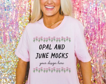 Mockup of Soft Pink T-Shirt: Photo of Model Wearing Soft Pink Bella Canvas 3001 Tee with Pink Backdrop | Cute Mock for Valentines or Spring