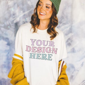 Ivory Tee Shirt Mockup for Print on Demand Sellers: Photo of Model Wearing Comfort Colors® C1717 T-Shirt | Colorful Grunge Aesthetic Mockup