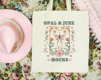 Tote Bag Mockup with Floral Cowgirl Aesthetic: Photo of Tote Bag on Cute Flower Background, Styled Studio Mockup of Canvas Tote with Hats