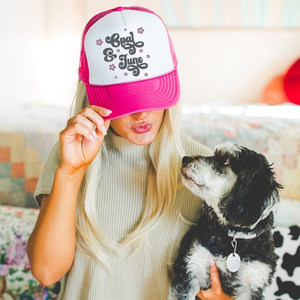 Pink Foam Trucker Mockup: Colorful Photo of Model Wearing Pink and White Otto Cap, Mesh Trucker Hat Mockup at Home, Cozy Lifestyle Mock