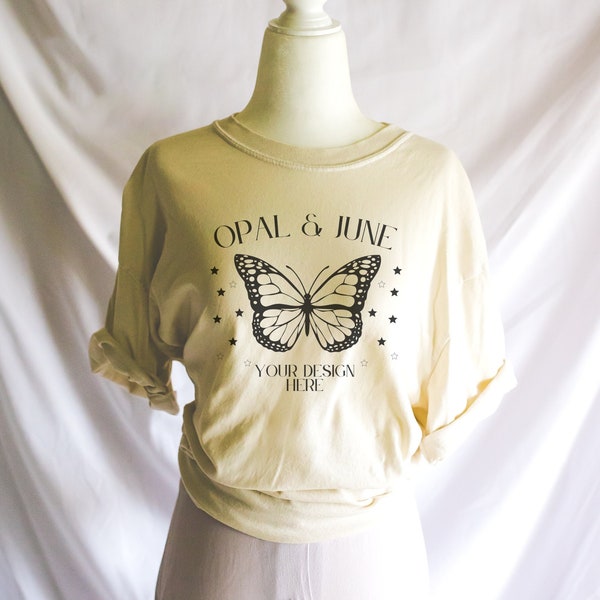 Mockup of Ivory Tee Shirt: Photo of Mannequin Wearing Ivory Comfort Colors® Tee Shirt | Cute and Minimal Studio Mockup for Spring or Summer