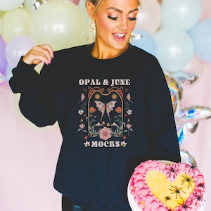 Cute Black Sweatshirt Mockup for Halloween: Colorful Photo of Model Wearing Black Gildan 18000 Crewneck for Groovy Spooky Season and Fall
