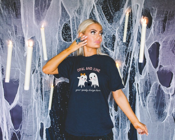 Black Shirt Mockup for Halloween with Spooky Candles: Photo of Model Wearing Black Comfort Colors® 1717 Tee Shirt | Colorful Mockup for Fall