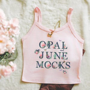 Pink Tank Top Mockup: Colorful Photo of Folded Pink Bella Canvas 1012 Tank Top, Simple Minimalist Lifestyle Mockup with Flowers for Summer
