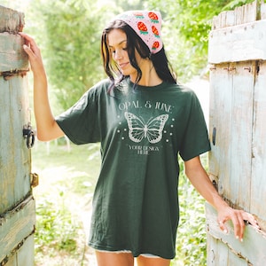 Forest Green Shirt Mockup: Colorful Photo of Model Wearing Forest Green Gildan 5000 Tee Shirt, Cute Boho Cottagecore Mockup Taken in Garden