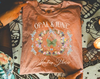 Yam Shirt Mockup: Colorful Photo of Model Folding Yam Comfort Colors® 1717 T-Shirt, Cozy Halloween Mock Taken at Home, Boho Butterflies Mock