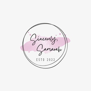 May include: A circular logo design featuring a thin black outline containing the black script text Sincerely, Samarah and the text ESTD 2022 below it. A soft, light pink watercolor brush stroke effect sits behind the script text within the circle.