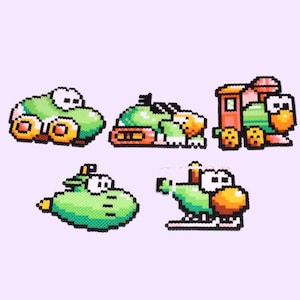 May include: Five pixel art style vehicles, including a car, a tank, a train, a submarine, and a helicopter. All vehicles are green with yellow accents and white eyes.