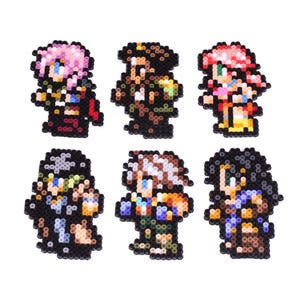 May include: Six pixel art character figures in various colors, including pink, brown, and blue. Each figure is made of small, square beads, and they are arranged in two rows of three on a white background. The characters appear to be from a video game.
