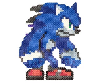 May include: A pixel art depiction of Sonic the Hedgehog, rendered in blue, white, gray, and red beads. The figure is in a dynamic pose, with a white belly, gray muzzle, and red shoes. The background is plain white.
