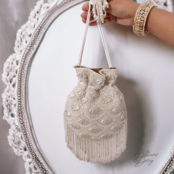 Ivory Breeze: Intricately Beaded Bridal Potli Bag | Bridal Clutch | Handmade Wedding day Bag