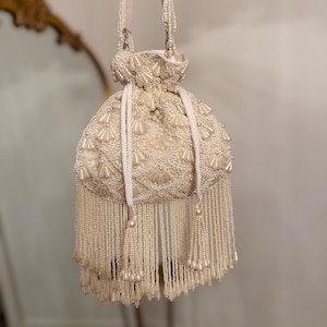 Ivory Breeze: Intricately Beaded Bridal Potli Bag | Bridal Clutch | Handmade Wedding day Bag