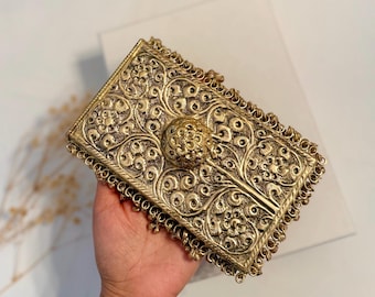 Pochette a forma di cellulare in oro antico Borsa indiana in