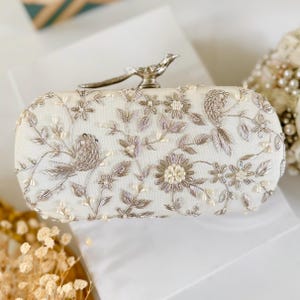 Ivory Bird-Motifs Bridal Clutch | Zordosi Bird Knob Clutch