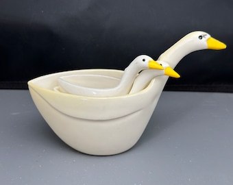 Vintage stacking geese measuring cups. There is the 1/4 cup, 1/3 cup and 1 cup. 1/2 cup is MISSING.