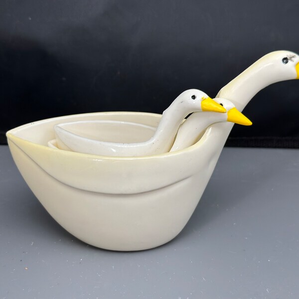 Vintage stacking geese measuring cups. There is the 1/4 cup, 1/3 cup and 1 cup. 1/2 cup is MISSING.