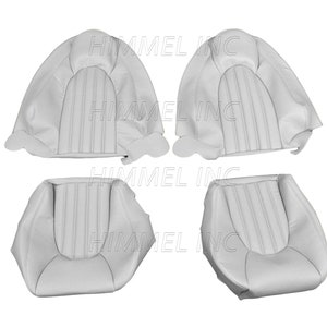 以下が含まれることがあります： 縦のステッチが入った白い革の車のシートカバー4枚セット。