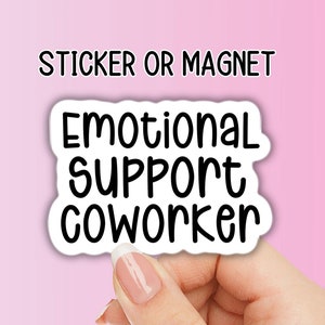 May include: White sticker or magnet with black text that reads "Emotional Support Coworker".