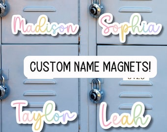 May include: Custom name magnets in pastel colors are displayed on a light blue locker. The names "Madison", "Sophia", "Taylor", and "Leah" are shown. The text "CUSTOM NAME MAGNETS!" is also displayed.
