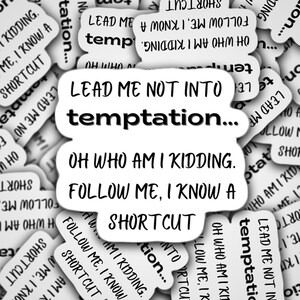 May include: A collection of white stickers with black text. The central sticker reads "LEAD ME NOT INTO temptation... OH WHO AM I KIDDING. FOLLOW ME, I KNOW A SHORTCUT." Other stickers have similar phrases.