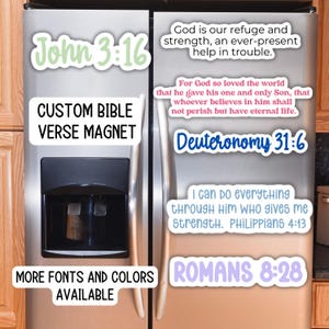 May include: A collection of custom Bible verse magnets in various colors and fonts, displayed on a refrigerator. The magnets feature verses like John 3:16, Deuteronomy 31:6, and Romans 8:28. The text "Custom Bible Verse Magnet" is also visible.