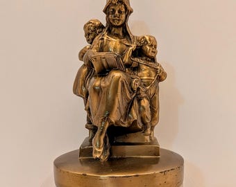 Vintage Brass Bookend: "The Colonial Mother" by P.M. Craftsman