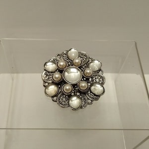 Vintage silver tone brooch with cabochons and faux pearls