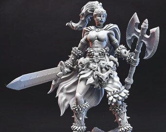 May include: A white 3D printed miniature of a female warrior with a sword and axe. She is wearing a horned helmet, a leather skirt, and fur bracers. The miniature is standing on a rocky base.