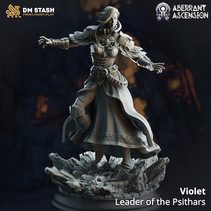 May include: A gray 3D printed miniature of a female figure in a flowing robe and armor, standing on a rocky base. The figure has long hair and is holding her arms out in a gesture of power. The text "Violet Leader of the Psithars" is printed below the figure.