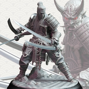 May include: A gray painted figurine of a samurai warrior holding two swords. The warrior is wearing traditional Japanese armor and clothing. The figurine is standing on a gray base.