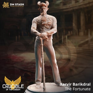 May include: A 3D printed miniature of a devilish figure with horns, a goatee, and a pipe. The figure is wearing a detailed, ornate suit with a cane in hand. The miniature is titled "Xarvir Barikdral The Fortunate" and is part of the "Crucible of the Chosen" collection.