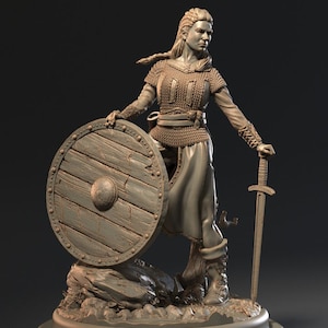 Beautiful and Stoic Viking Shieldmaiden by Apache Studios. Printed in ABS-like resin for added durability, 32mm and 75mm scale options.
