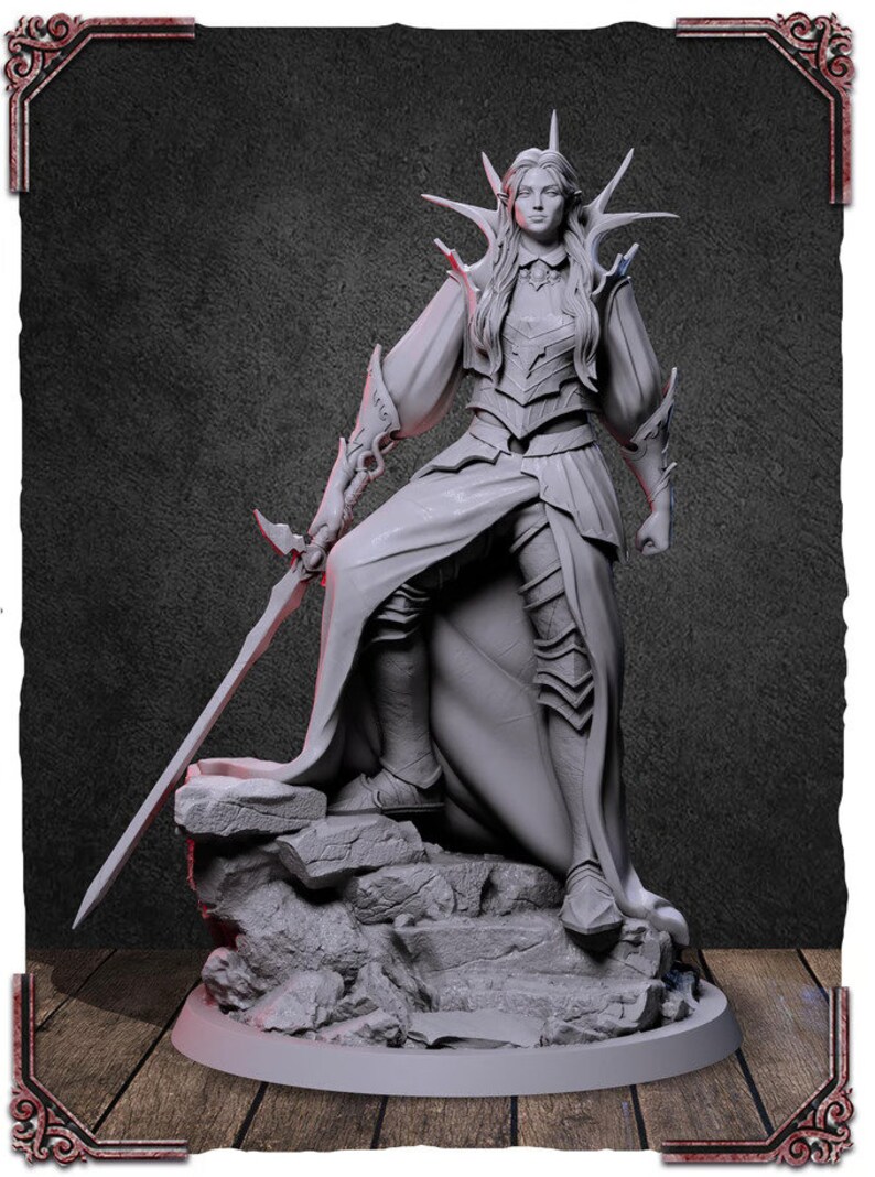May include: A gray, detailed figurine of a female warrior with long hair, wearing a flowing robe and armor, holding a sword. She stands on a rocky base.
