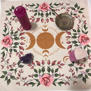 May include: A white ceramic mug with a black handle and the text "But First, Coffee" in a bold, black font. The mug is set against a neutral background, highlighting its simple design.