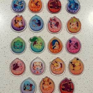 Anime inspired tamagotchi badge reels, pins, multiple types available, alligator clip spin badge reel