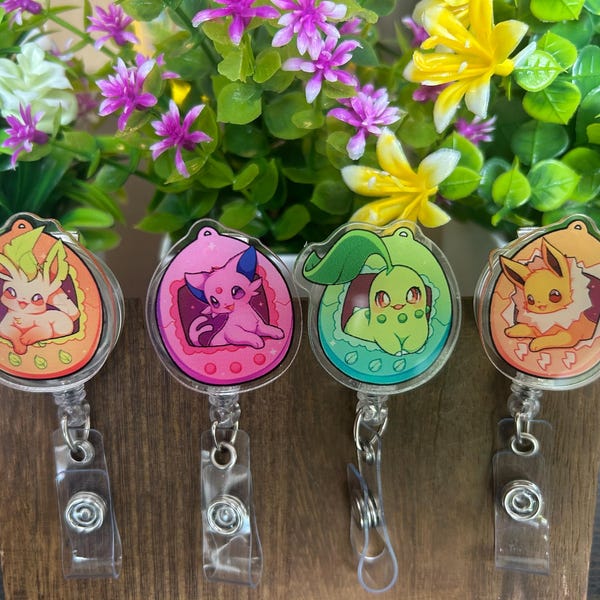 Anime inspired tamagotchi badge reels, pins, multiple types available, alligator clip spin badge reel