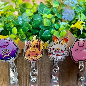 Anime inspired badge reels, multiple types available, alligator or belt clip spin badge reel, pin option