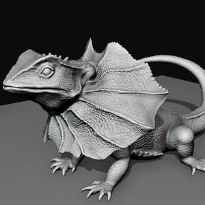 Peut inclure: Modèle 3D gris d'un lézard à collerette avec une grande collerette autour du cou. Le lézard est posé avec la tête tournée sur le côté et la queue enroulée autour du corps.
