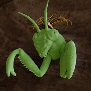 Peut inclure: Une sculpture de mante religieuse verte avec une surface texturée brune et dorée. La sculpture est montée sur un mur.