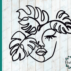 May include: Line art illustration of a woman's face with a tropical leaf design. The woman's eyes are closed and her lips are slightly parted. The leaves are stylized and have a flowing, organic shape.