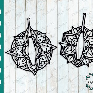 Puede incluir: Diseño de mandala en blanco y negro con un solo palo de malabares en el centro. El mandala tiene detalles intrincados y un patrón floral.