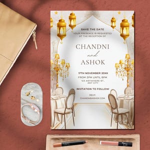 May include: A white wedding invitation with gold accents. The invitation features a save the date for Chandni and Ashok's wedding on November 17th. The invitation includes the time and location of the reception. The invitation also includes a website for RSVP.